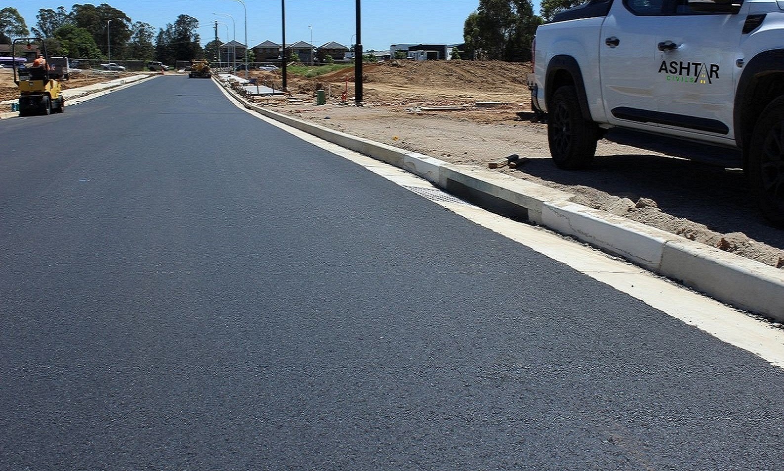 Image shows a fresh Asphalt road by Ashtar Civils